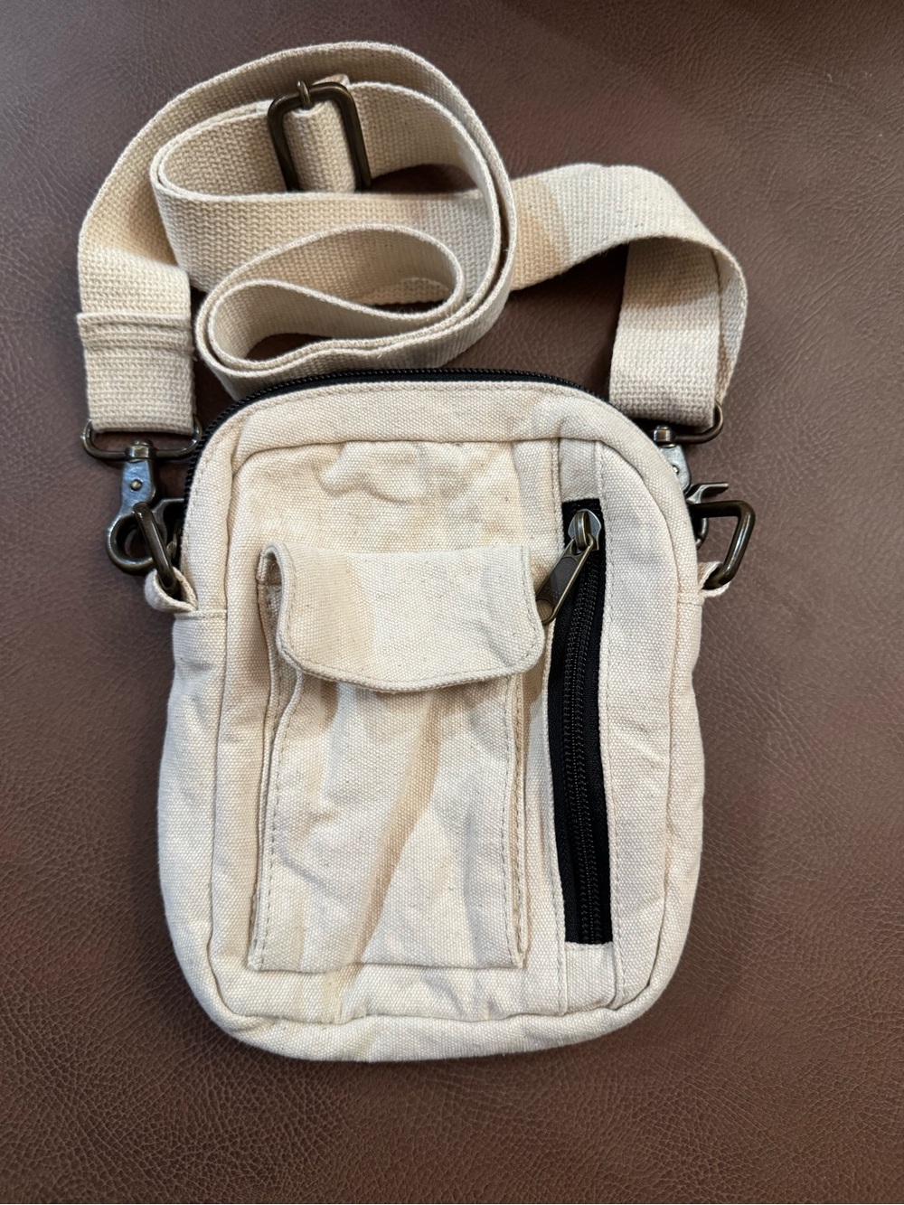 Mike Mini Canvas Crossbody Pouch from Urban Outfitters.